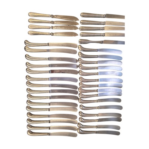 32 - A collection of sterling silver and white metal handled knives, two of the sets by Asprey's .