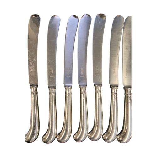 32 - A collection of sterling silver and white metal handled knives, two of the sets by Asprey's .