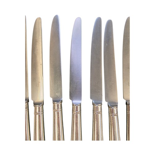 32 - A collection of sterling silver and white metal handled knives, two of the sets by Asprey's .