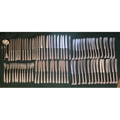 32 - A collection of sterling silver and white metal handled knives, two of the sets by Asprey's .