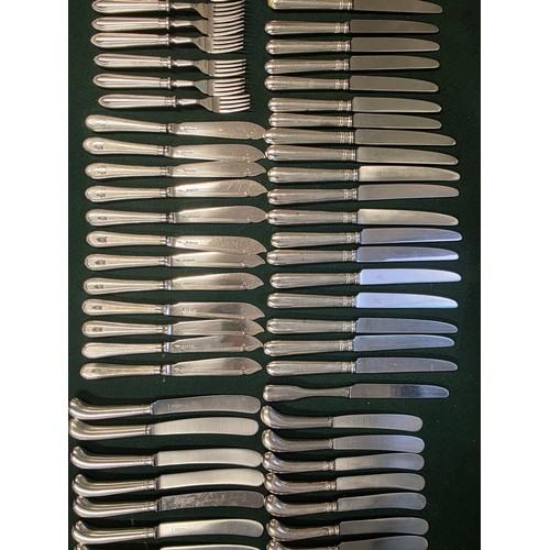 32 - A collection of sterling silver and white metal handled knives, two of the sets by Asprey's .