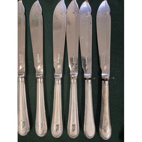 32 - A collection of sterling silver and white metal handled knives, two of the sets by Asprey's .