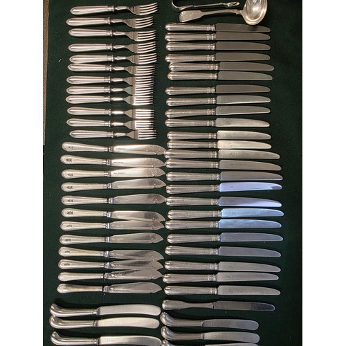 32 - A collection of sterling silver and white metal handled knives, two of the sets by Asprey's .