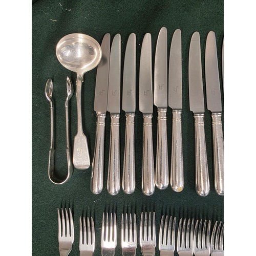 32 - A collection of sterling silver and white metal handled knives, two of the sets by Asprey's .