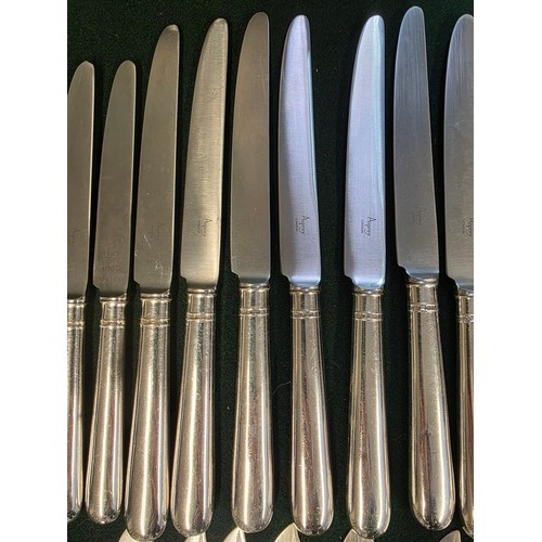 32 - A collection of sterling silver and white metal handled knives, two of the sets by Asprey's .