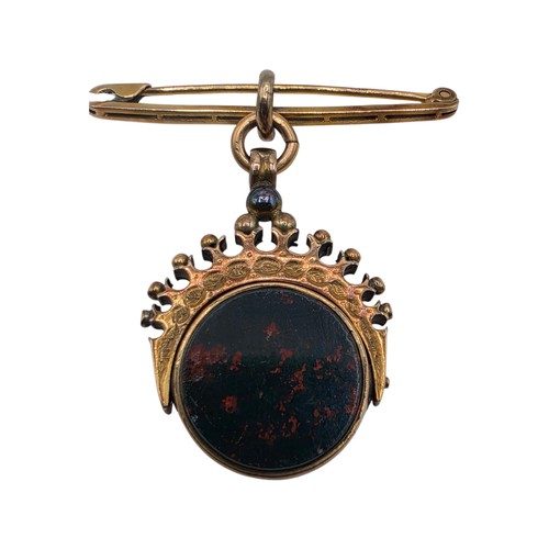 252 - Unmarked yellow metal swivel watch fob with bloodstone panel on 9 ct gold pin brooch, 6.6 g