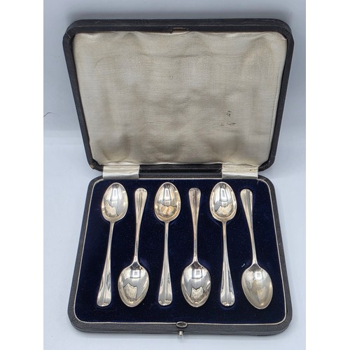 64 - A set of boxed sterling silver teaspoons by James Dixon & Sons Sheffield 1918.  93 g