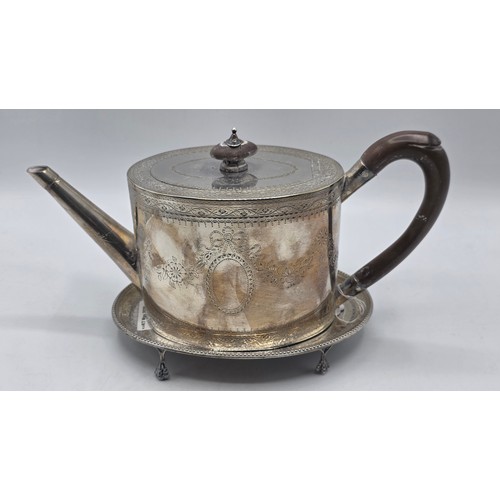 59 - A sterling silver teapot with chased swag and ribbon decoration by IW London 1782 with similar decor... 
