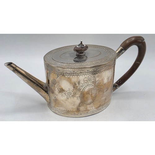 59 - A sterling silver teapot with chased swag and ribbon decoration by IW London 1782 with similar decor... 