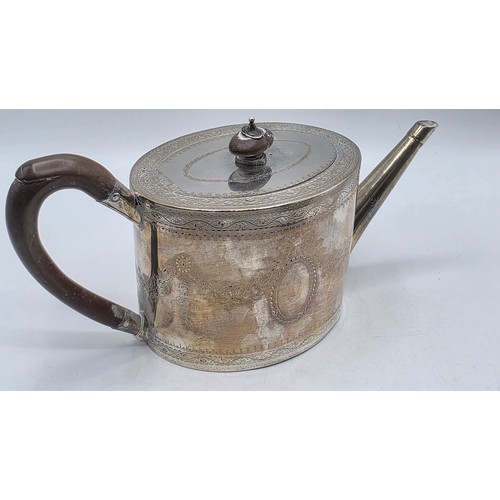 59 - A sterling silver teapot with chased swag and ribbon decoration by IW London 1782 with similar decor... 