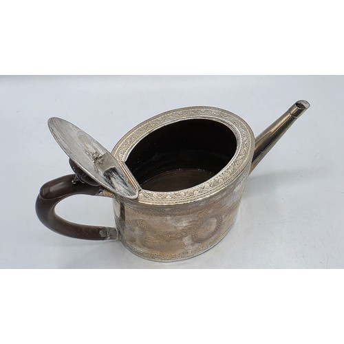 59 - A sterling silver teapot with chased swag and ribbon decoration by IW London 1782 with similar decor... 