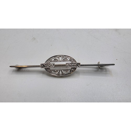 72 - A collection of sterling silver items to include decanter label, pill box, mounted rattle etc