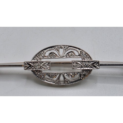 72 - A collection of sterling silver items to include decanter label, pill box, mounted rattle etc