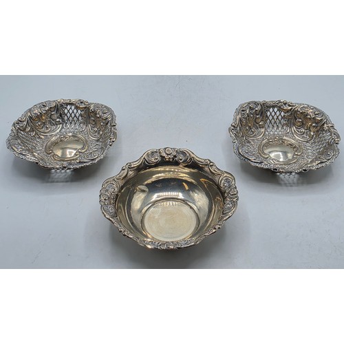 66 - Two sterling silver pierced dishes together with one small sterling silver bowl, various dates and m... 