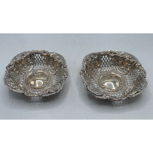66 - Two sterling silver pierced dishes together with one small sterling silver bowl, various dates and m... 