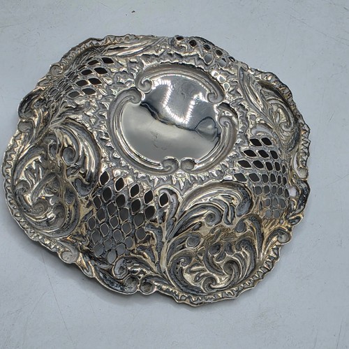 66 - Two sterling silver pierced dishes together with one small sterling silver bowl, various dates and m... 