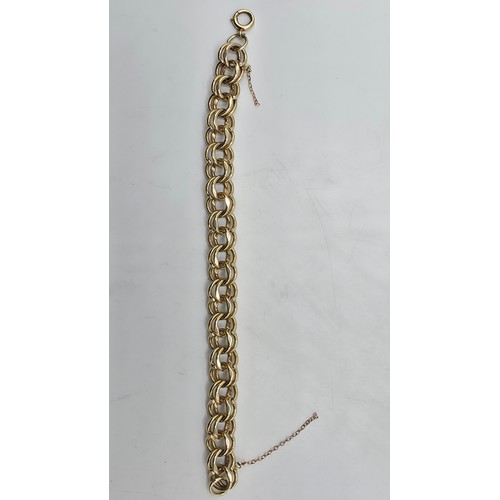 3 - A 9ct gold double fancy link bracelet, 21 cm, 37.7g