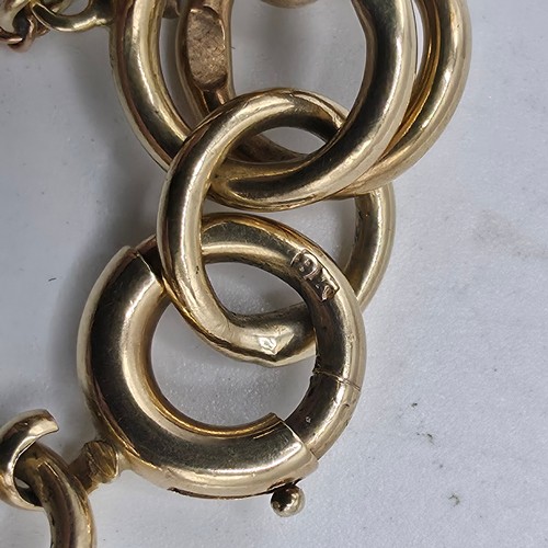 3 - A 9ct gold double fancy link bracelet, 21 cm, 37.7g