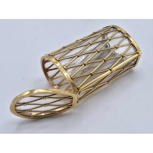 6 - CARTIER, An 18ct gold mounted glass cigarette case marked Cartier London K5001, lattice work constru... 