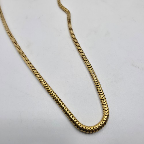 79 - An unmarked yellow metal snake link necklace 42 cm, 8.3 g