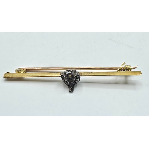 80 - A 15ct gold bar brooch with white metal fox head set with rose cut diamonds and ruby eyes 3.1 g, tog... 