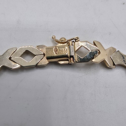 38 - A 9ct gold flat fancy link necklace. 43cm. 20g