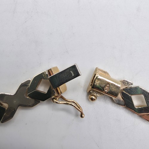 38 - A 9ct gold flat fancy link necklace. 43cm. 20g