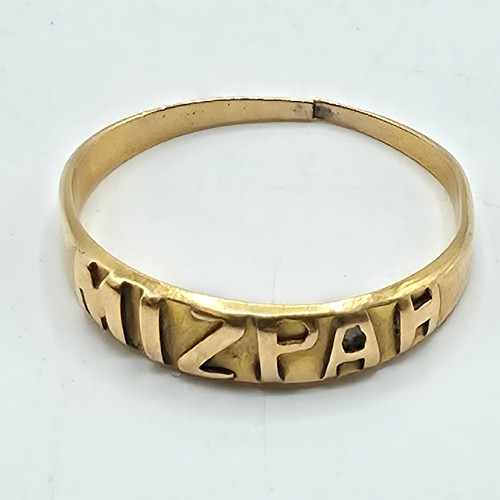 48 - An 18ct gold band. 1g. Marked to band  'Mizpah'
