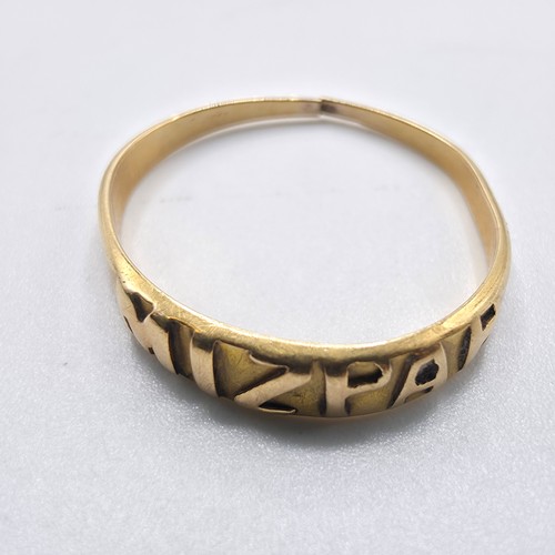 48 - An 18ct gold band. 1g. Marked to band  'Mizpah'