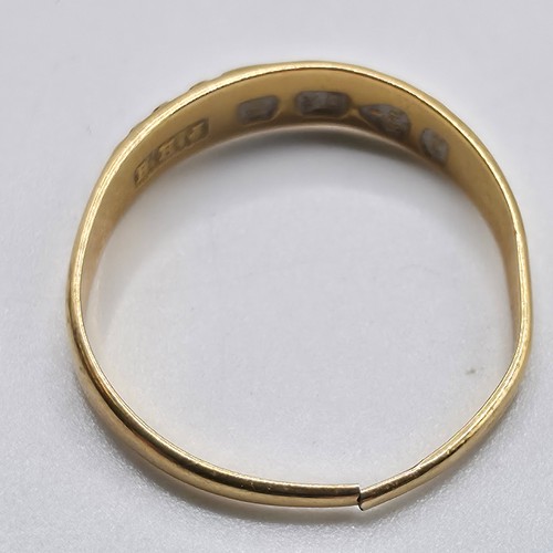 48 - An 18ct gold band. 1g. Marked to band  'Mizpah'
