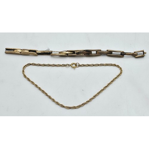 50 - A 9ct gold chain link bracelet 18cm together with a 9ct gold elasticated watch strap. 4.2g.