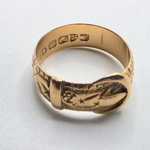 47 - An 18ct gold buckle ring. Size N. 5.6g