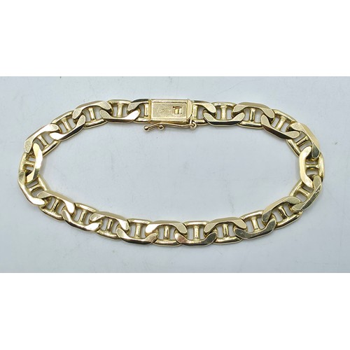 41 - A 15ct gold flat fancy link bracelet. 19cm. 20.6g