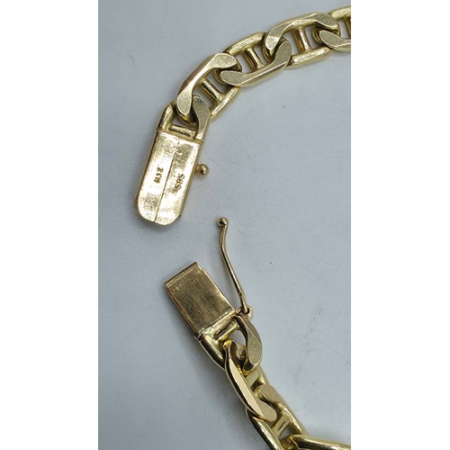 41 - A 15ct gold flat fancy link bracelet. 19cm. 20.6g