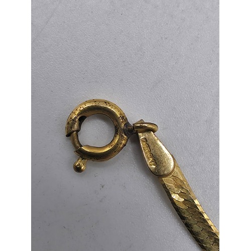 52 - A 9ct gold flat fancy link necklace 39cm. 2.6g.