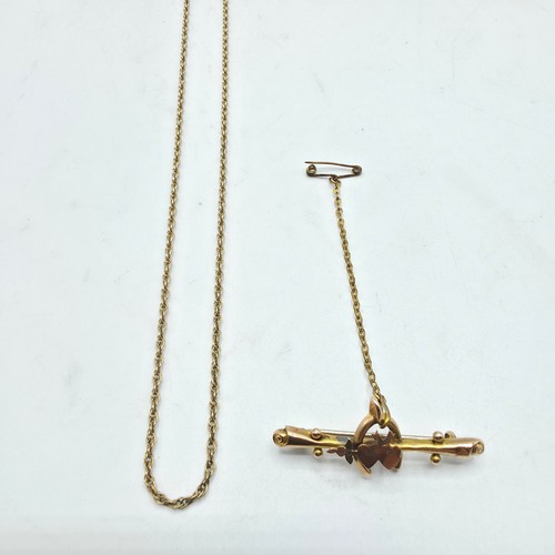 44 - A 9ct gold chain link necklace 49cm together with a 9ct gold bar brooch. 5.4g