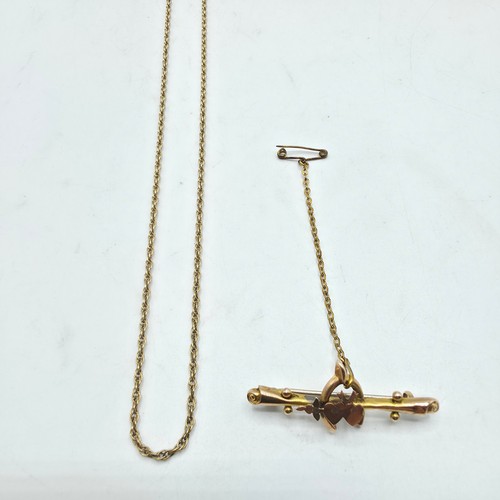 44 - A 9ct gold chain link necklace 49cm together with a 9ct gold bar brooch. 5.4g