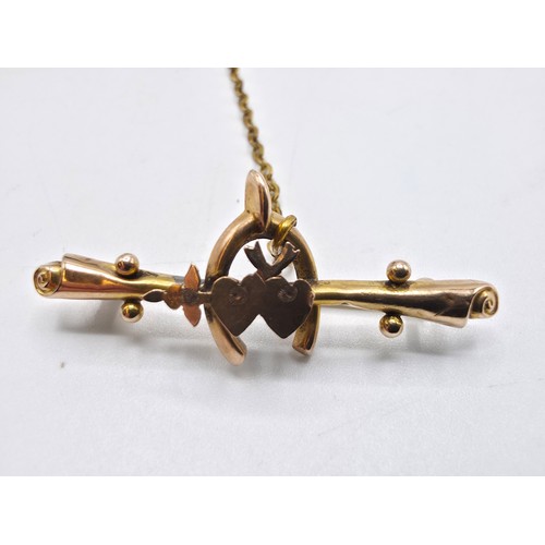44 - A 9ct gold chain link necklace 49cm together with a 9ct gold bar brooch. 5.4g