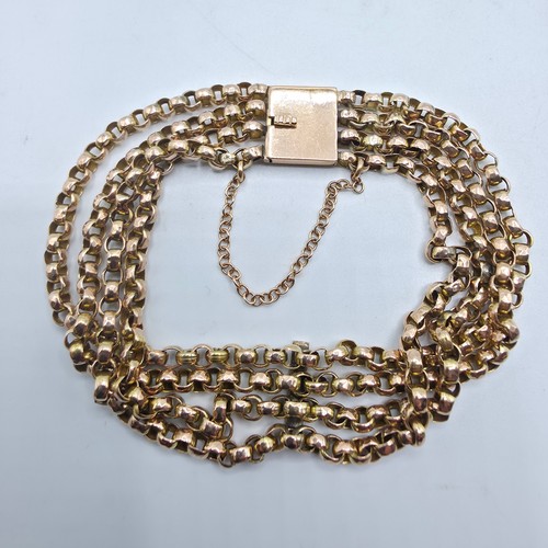 42 - A 9ct gold four strand curb link bracelet 20cm. 12.4g