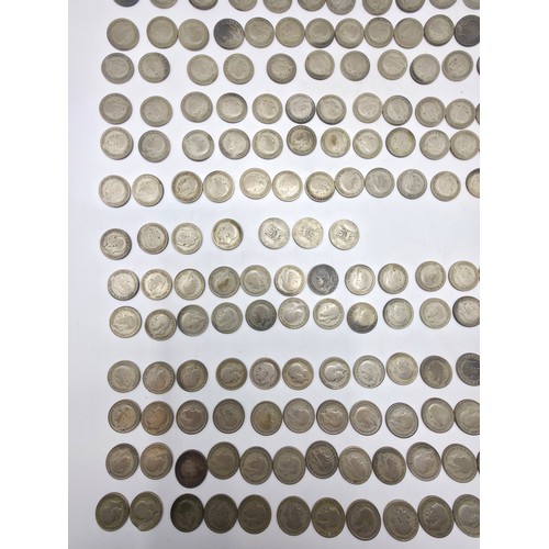 31 - A collection of 20th century Sixpences.  1920-1936. With a small collection of other UK and World co... 