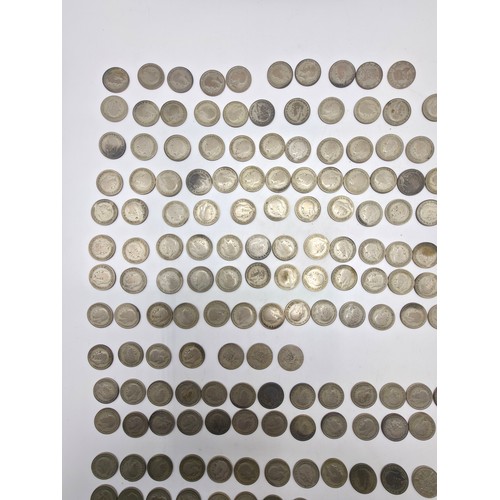 31 - A collection of 20th century Sixpences.  1920-1936. With a small collection of other UK and World co... 