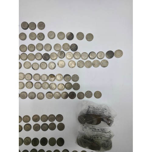31 - A collection of 20th century Sixpences.  1920-1936. With a small collection of other UK and World co... 