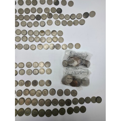 31 - A collection of 20th century Sixpences.  1920-1936. With a small collection of other UK and World co... 