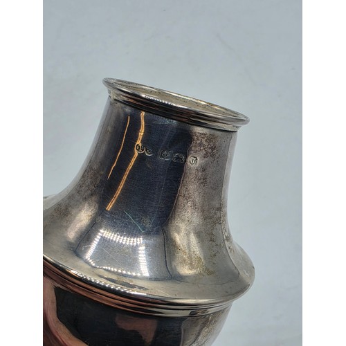 20 - A sterling silver sugar shaker, TS, Birmingham, 1858. 150g.