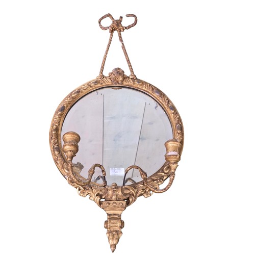 310 - Four decorative gilt wall mirrors