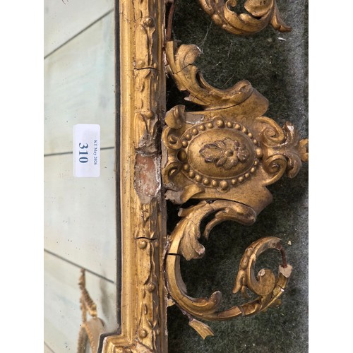 310 - Four decorative gilt wall mirrors