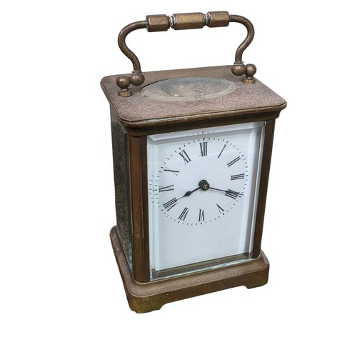81 - Three clocks, to include a black slate mantel clock,  a French gilt metal mantel clock with 8 day mo... 