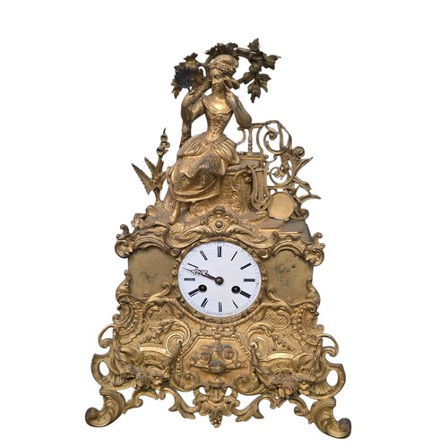 81 - Three clocks, to include a black slate mantel clock,  a French gilt metal mantel clock with 8 day mo... 