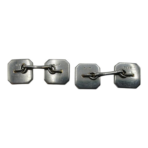 91 - A pair of platinum black onyx and single cut diamond double sided octagonal shaped cufflinks togethe... 
