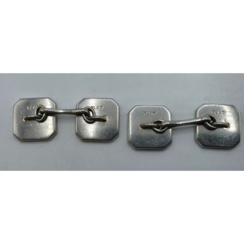 91 - A pair of platinum black onyx and single cut diamond double sided octagonal shaped cufflinks togethe... 